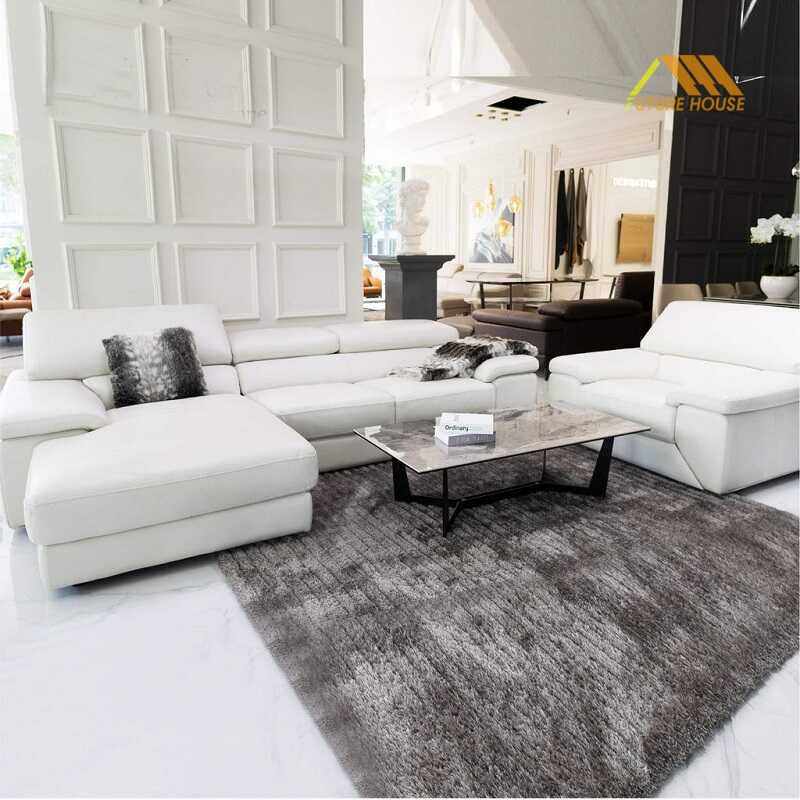 Thảm phòng khách tạo điểm nhấn tương phản với sofa